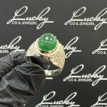 Zilveren ring met groene steen